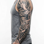 Tatuaggio semi-permanente INKON Dove, Eye & Anchor applicato su un uomo – design 8 x 20 in (20x50cm), aspetto realistico dell'inchiostro, dura 10 giorni